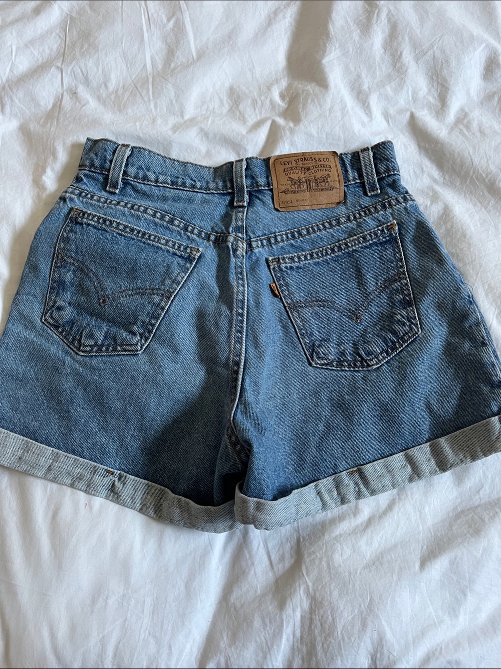 Levi’s vintage light wash cuffed 954 denim jean shorts